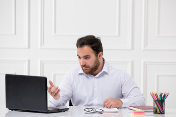 ADHD with computer young brunette office worker at work behind the desk on zoom call