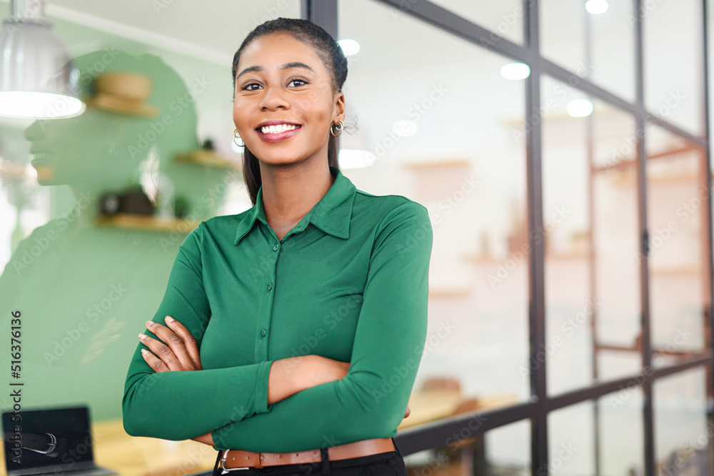 Wall mural portrait of confident african-american businesswoman standing with arms crossed, multiracial female 