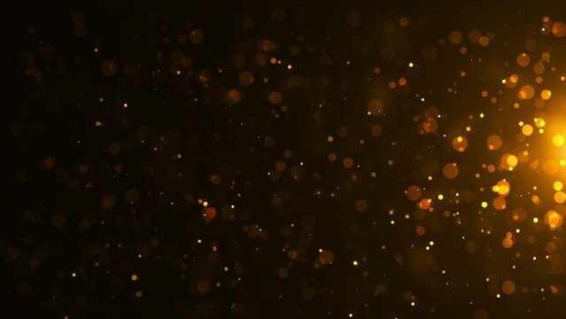 Abstract gold glitter on black background. Looped 4K video