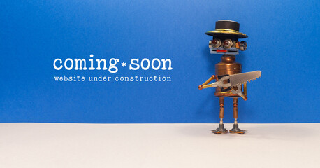 Web site under construction Coming Soon page. Toy mechanic repairman robot with saw. Blue white...