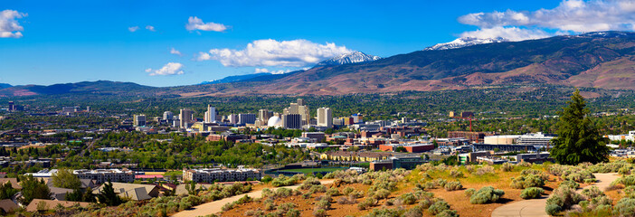 Downtown Reno skyline, Nevada, with hotels, casinos and surrounding mountains