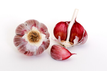 Closeup of raw garlic bulb on white background
