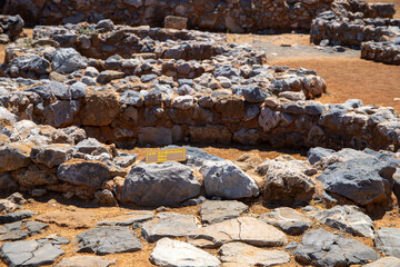 Ancient archaeological site in Crete with stone ruins