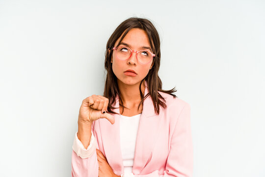 Young hispanic woman isolated on blue background whining and crying disconsolately.