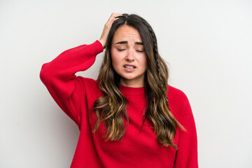 Young caucasian woman isolated on white background tired and very sleepy keeping hand on head.