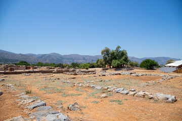 Fototapeta na wymiar Ancient archaeological site in Crete with stone ruins