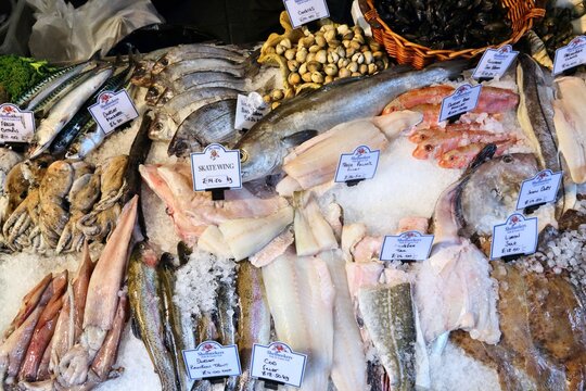 LONDON, UK - APRIL 22, 2016: Fish stall at Borough Market in Southwark, London. It is one of oldest markets in Europe. Its 1,000th birthday was in 2014.