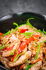 delicious chinese fried noodles on a black background