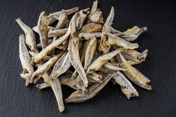 fragrant fish sauce on a black stone background