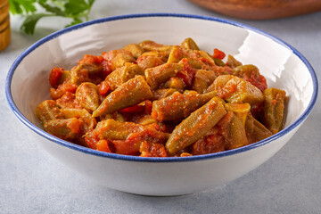 Homemade okra stew in bowl. Closeup