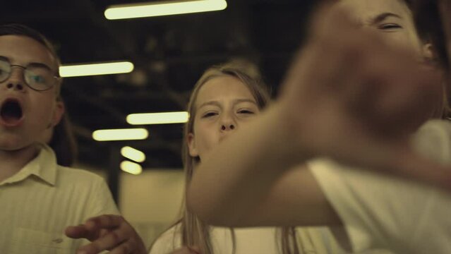 Angry teenagers shouting bullying conflict victim. Bullies insulting classmate.