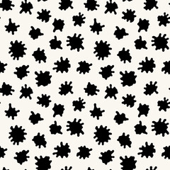 Vector seamless pattern. Free form organic shapes. Stylish structure of natural spots. Hand-drawn abstract background. Can be used as a tileable swatch. Monochrome spotty print.