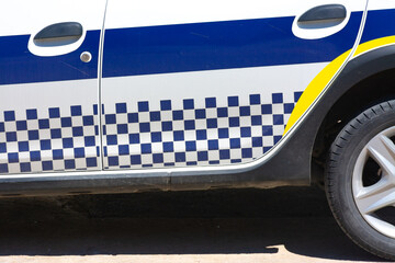 Checkered decal in a police car