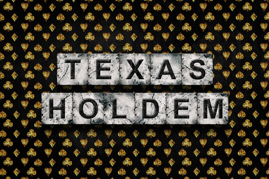 Texas Holdem, word on stone blocks, on a grunge, poker background with various grunge card suits.Gambling concept.