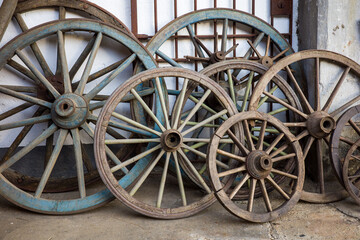 Fototapeta na wymiar Old wagon wheels at a farm