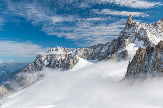 The Geant glacier in the massif of Mont Blanc; in the background the peak of the Dent du G&eacute;ant
