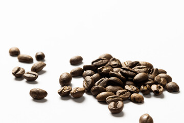 Image of pill of a coffee beans on a white background