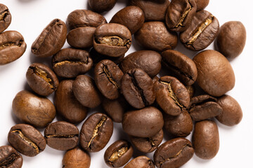 Image of pill of a coffee beans on a white background