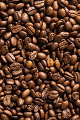 Image of close up of pile of roasting brown coffee beans