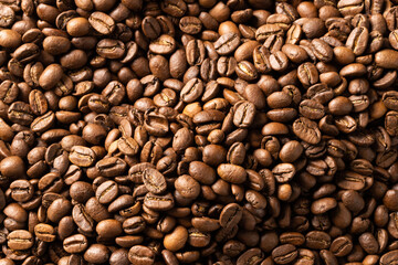 Image of close up of pile of roasting brown coffee beans