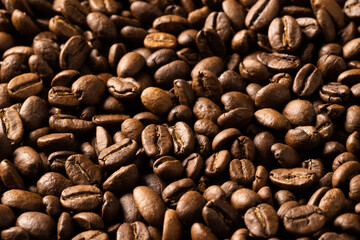 Image of close up of pile of roasting brown coffee beans