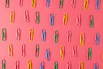 Composition of colorful clips on pin surface