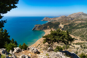 Fototapeta na wymiar View from the mountain to the bay with beaches. Rhodes, Greece.