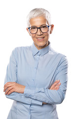 Senior Expert businesswoman with glasses in a blue shirt and gray white hair and glasses