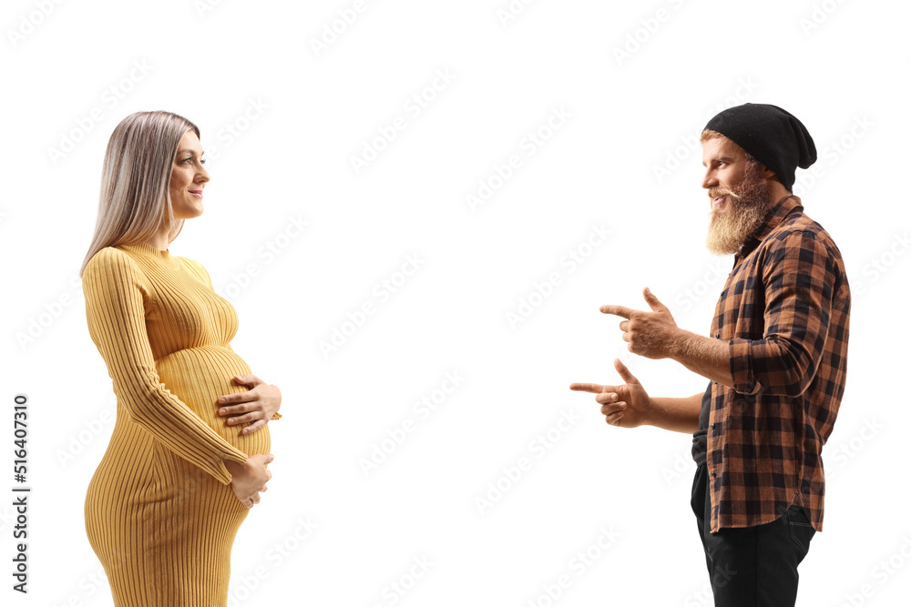 Wall mural profile shot of a bearded hipster guy talking to a pregnant woman