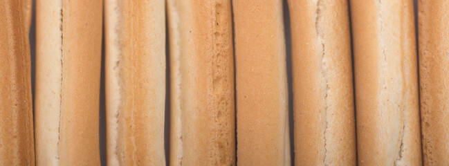 Closeup of bread texture background. Breadsticks.  Wheat. Brown. Lines. Copy space. Ideas. Concept 