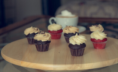 chocolate cupcakes with cream frosting