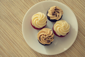 cupcakes with cream and chocolate