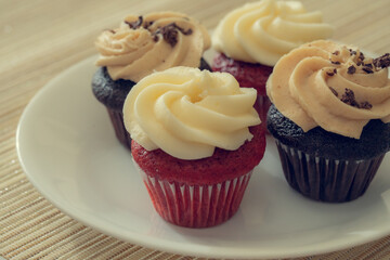 cupcakes with cream and chocolate