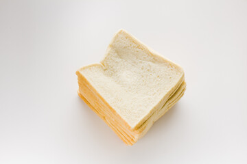 Loaf of sliced white bread isolated on white background