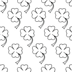 Beautiful background of clover drawn with a black marker on white paper. Seamless nature pattern. Print for bed linen. Saint Patrick's day concept. St. Patrick's background. 