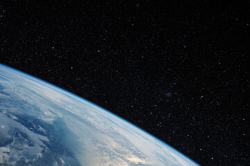 The earth from space in a star field. Elements of this image furnished by NASA.
