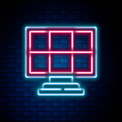 Glowing neon line Solar energy panel icon isolated on brick wall background. Colorful outline concept. Vector