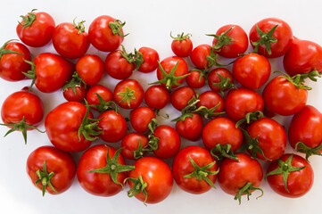 tomato scattered on a white background.  product packaging design of tomato juice, pasta, croutons, chips.  phone screensaver, website design.