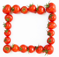 Photo of a ripe tomato on a white background in the form of a frame with a place for text.  product packaging design of tomato juice, pasta, croutons, chips.  Banner, signboard and background 