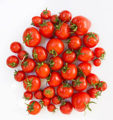 Photo of a ripe tomato on a white background.  Print for printing on tablecloths, napkins, household goods and product packaging design for tomato juice, pasta, snacks.  Banner, signboard