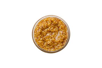 Bowl of Dijon mustard sauce isolated on white background. top view