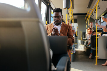 Black businessman working on commute