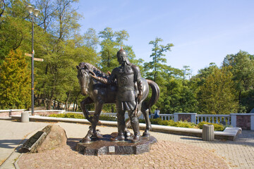 Monument to Dobrynya Nikitich with a horse in Drevlyanskiy park in Korosten, Ukraine