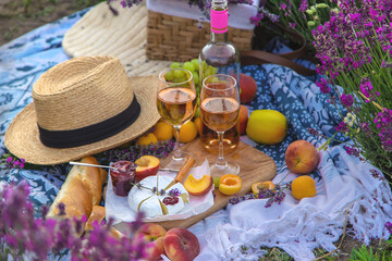 Wine in a lavender field. Selective focus.