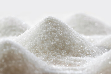 Fototapeta na wymiar Refined sugar. Shape of sugar hills close up. background image