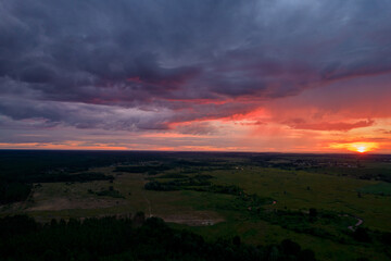 red sunset in storm clouds