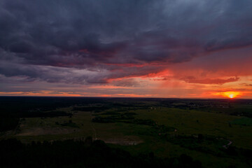 red sunset in storm clouds