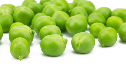 A group of fresh green young peas (Pisum sativum) seed isolated on white background,  front view closeup, the beans remove from the pods.