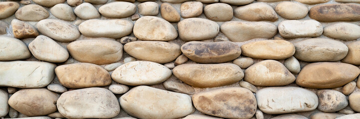 Fototapeta na wymiar Stone laying of an old wall