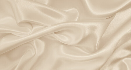 Smooth elegant golden silk or satin luxury cloth texture as wedding background. Luxurious background design. In Sepia toned. Retro style